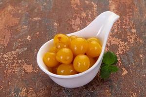 Yellow ripe cherry dessert photo