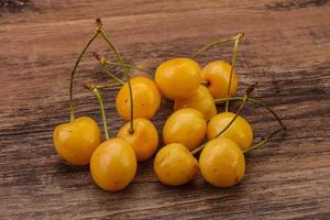 Sweet ripe yellow cherry heap photo