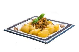 Lumaconi with pork and basil photo