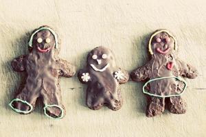 Gingerbread family. Handmade in home, decorated by children. Vintage photo