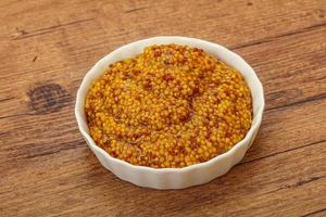 Dijon mustard sauce with seeds photo