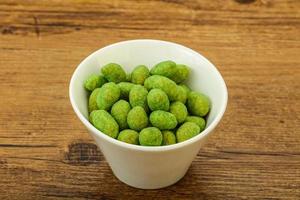 Spicy wasabi peanuts in the bowl photo