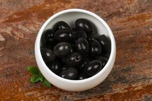 Black olives in the bowl photo