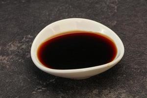 Asian soya sauce in the bowl photo