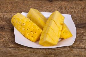 Sliced sweet ripe tasty pineapple photo