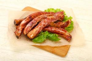 Smoked pork ribs photo