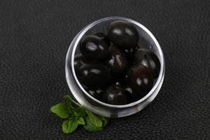 Black olives in the bowl photo