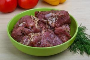 Raw marinated meat for bbq photo