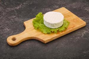 Delicous Brie round soft cheese photo