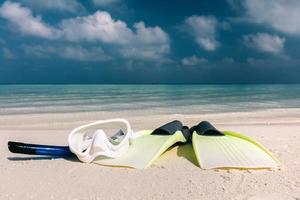 Snorkel gear on sand photo