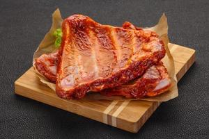 Raw marinated pork ribs photo