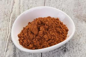 Cocoa powder in the bowl photo