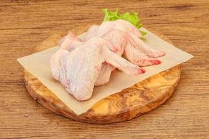 Raw chicken wings for cooking photo