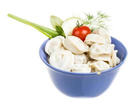 Bowl with traditional russian dish - pelmeni photo