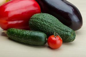 Eggplant, cucumber, avocado and red pepper photo