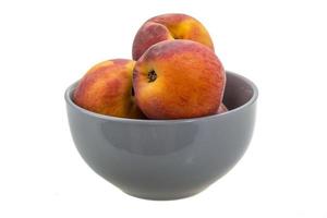 Bright ripe peaches photo