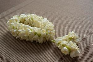 A jasmine garland on the table photo