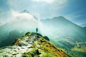 Person in mountain landscape photo