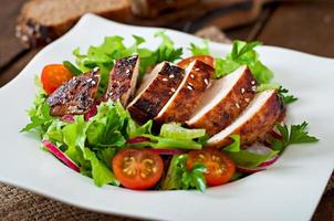 Fresh vegetable salad with grilled  chicken breast.