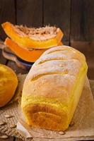 Fresh homemade pumpkin bread and pumpkin slices and olives photo