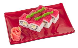 Maki Sushi - Roll made of Crab, avocado, cucumber inside. Fresh Tuna and tobico roe outside photo