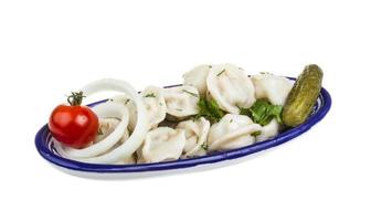 Bowl with traditional russian dish - pelmeni photo