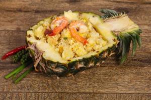 Fried rice with pineapple and prawns photo