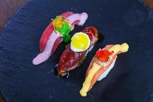 Sushi with tuna, salmon and beef photo