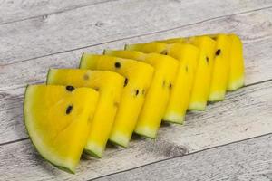 Sliced sweet tasty yellow watermelon photo