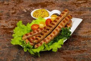 Grilled pork sausages photo