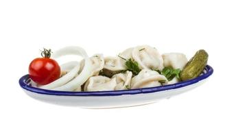 Bowl with traditional russian dish - pelmeni photo