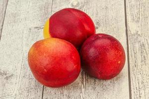 Sweet ripe and tasty Nectarine photo