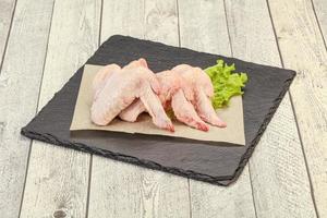 Raw chicken wings for cooking photo