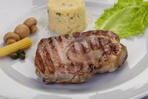 Grilled pork neck steak photo