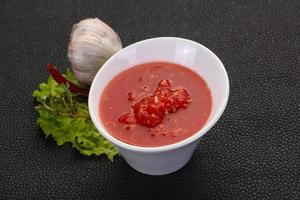 Spicy tomato and garlic sauce photo