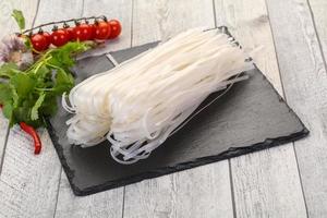 Raw rice noodles photo