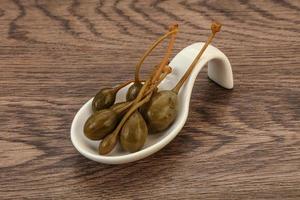 Caper berries in the bowl photo