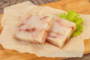 Raw pollock fish fillet for cooking photo