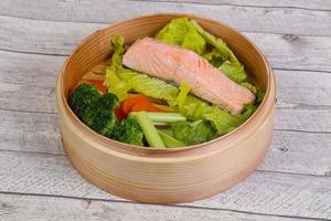 Steamed salmon with vegetables photo