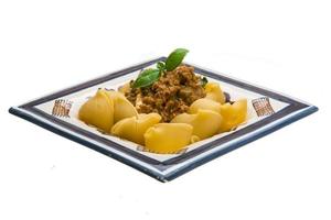 Lumaconi with pork and basil photo