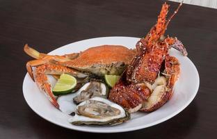 Spiny lobster, crab and oyster photo