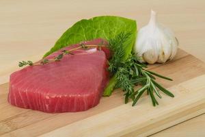 Raw tuna steak photo