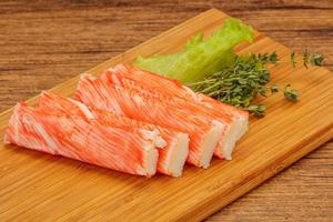 Crab sticks served salad leaves photo