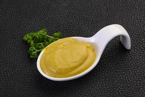 Mustard sauce in the bowl photo