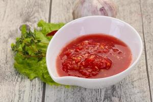 Spicy tomato and garlic sauce photo