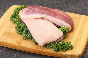 Raw duck breast for cooking photo