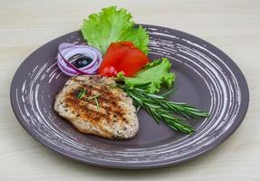 Grilled pork steak photo