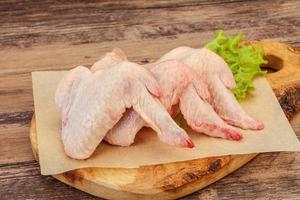 Raw chicken wings for cooking photo