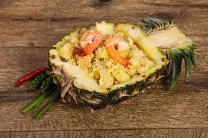 Fried rice with pineapple and prawns photo