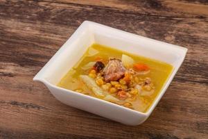 Pea soup with smoked ribs photo
